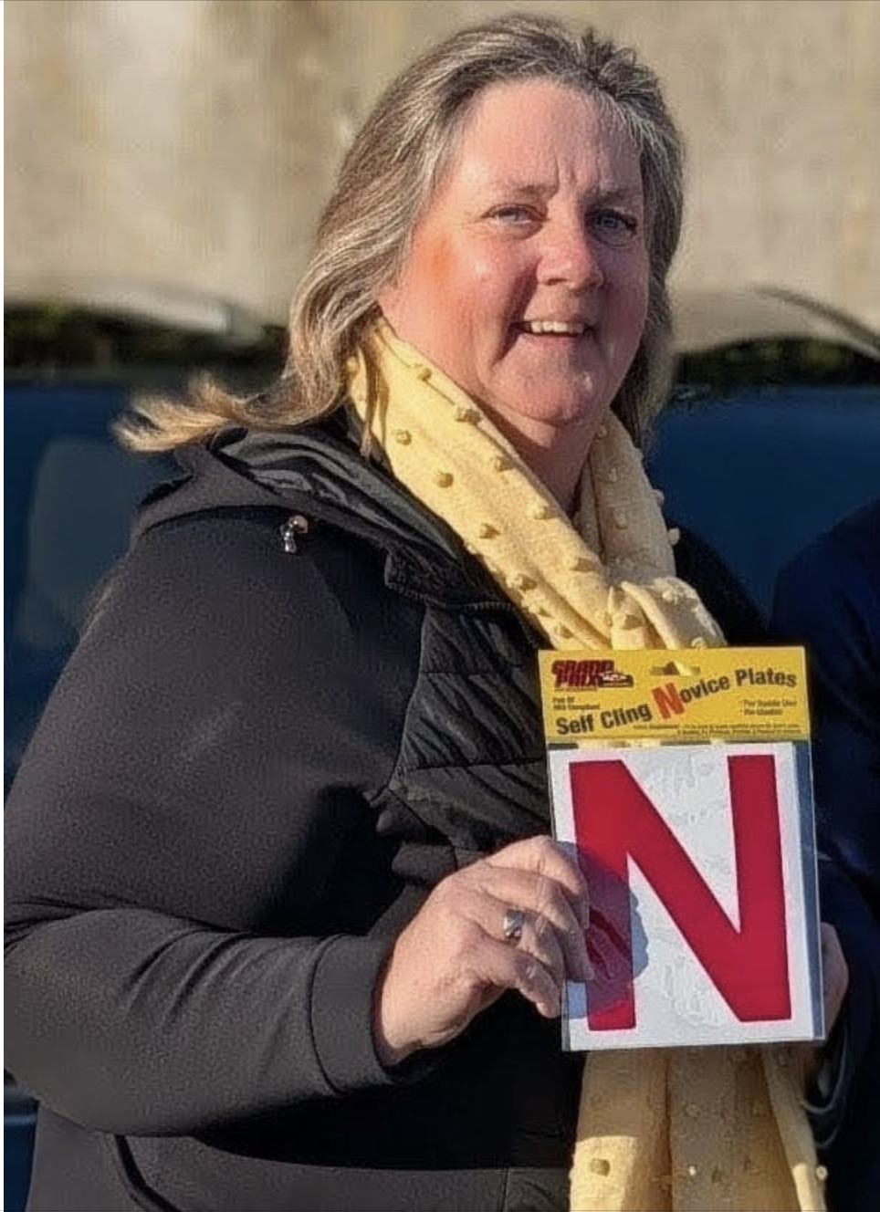 Vicki with novice driver plates ready for a lesson